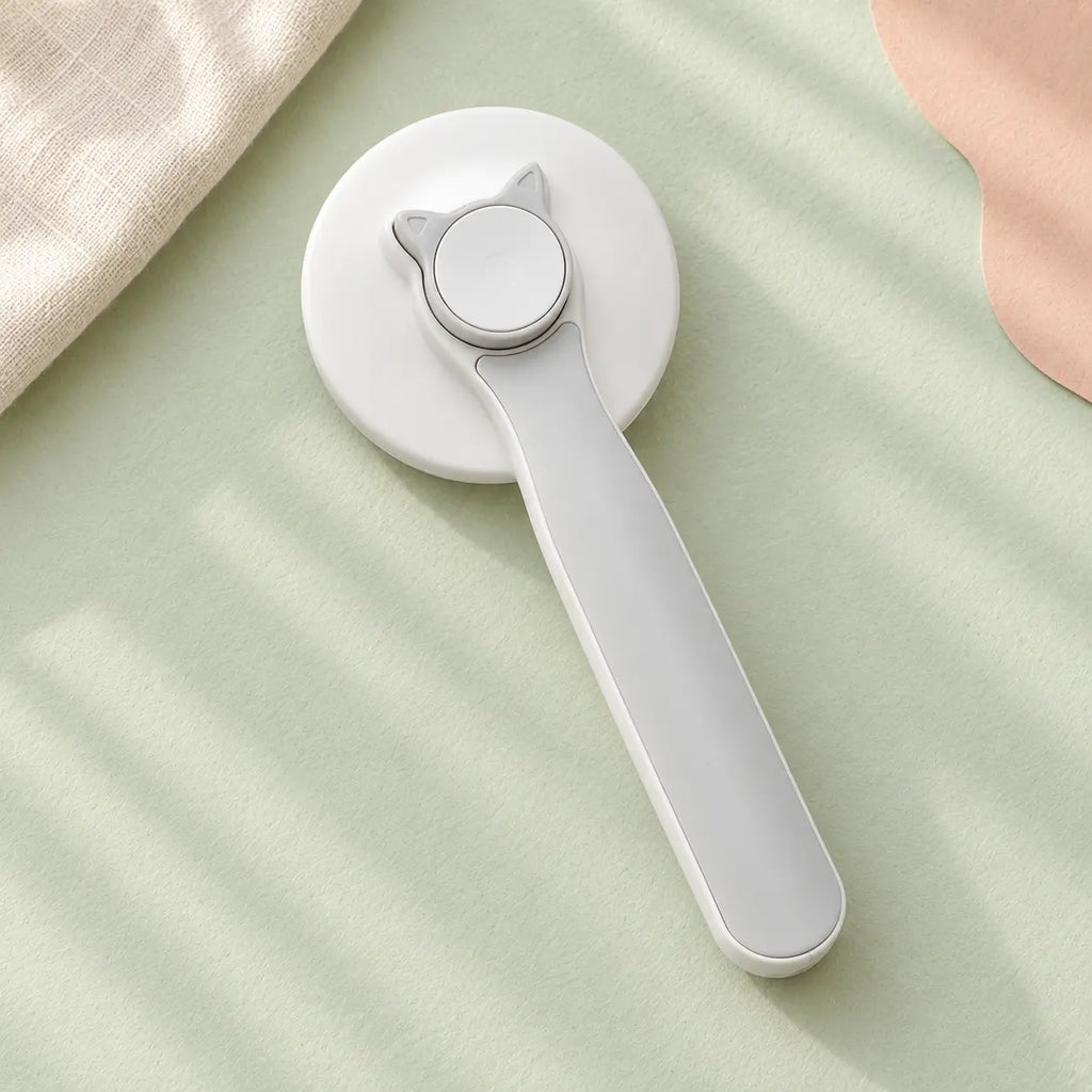 Brosse autonettoyante anti-mue coloris gris — design ergonomique